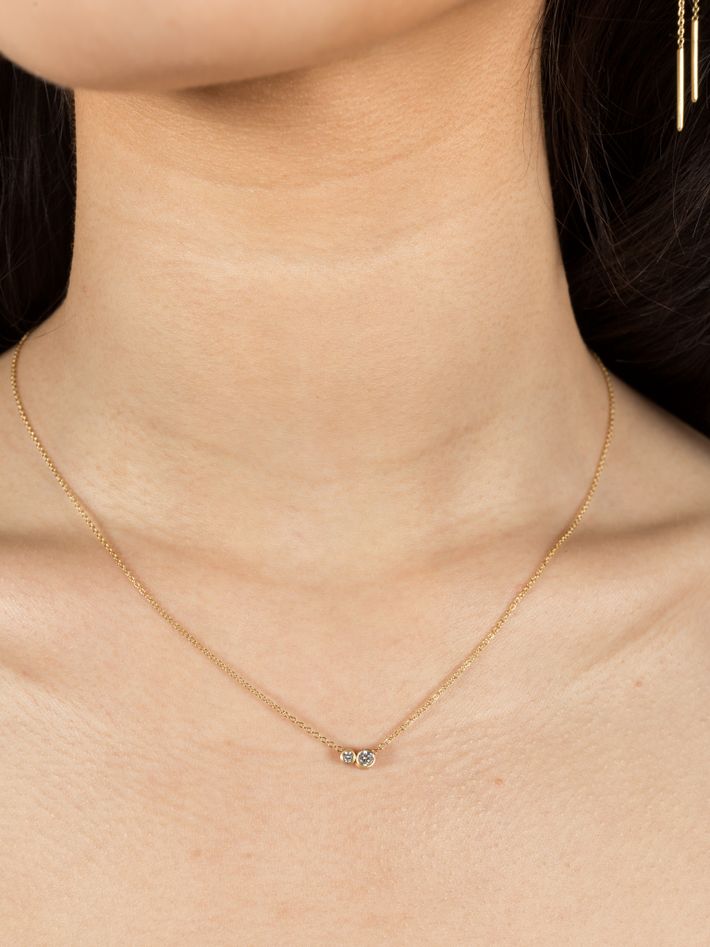 Two diamonds on a chain necklace