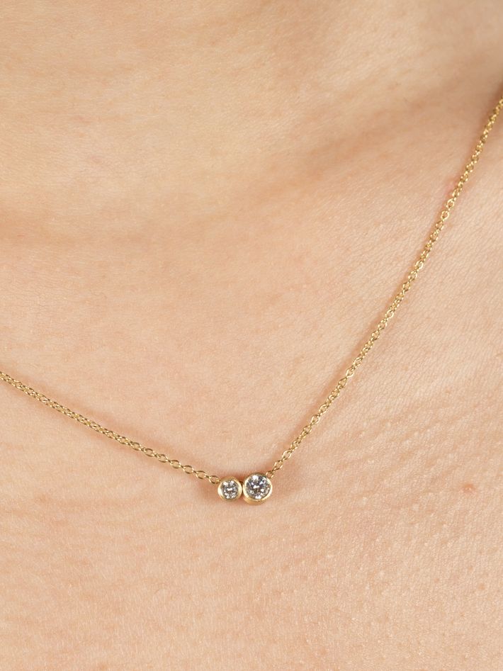 Two diamonds on a chain necklace