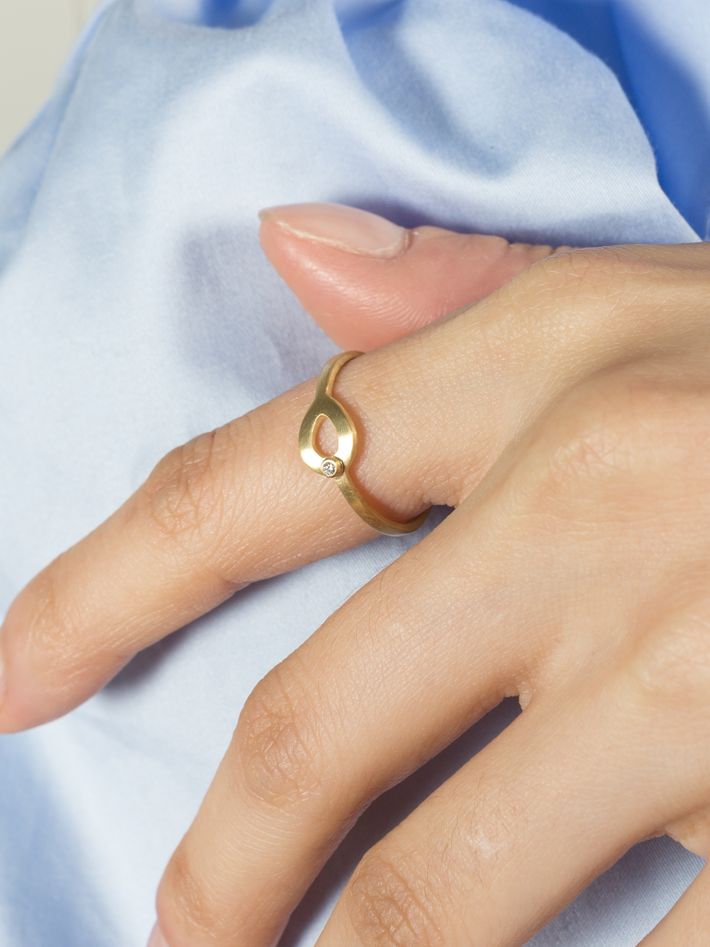 Petal open small diamond ring