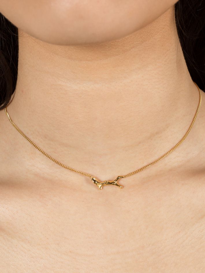 Necklace with branch-shaped element