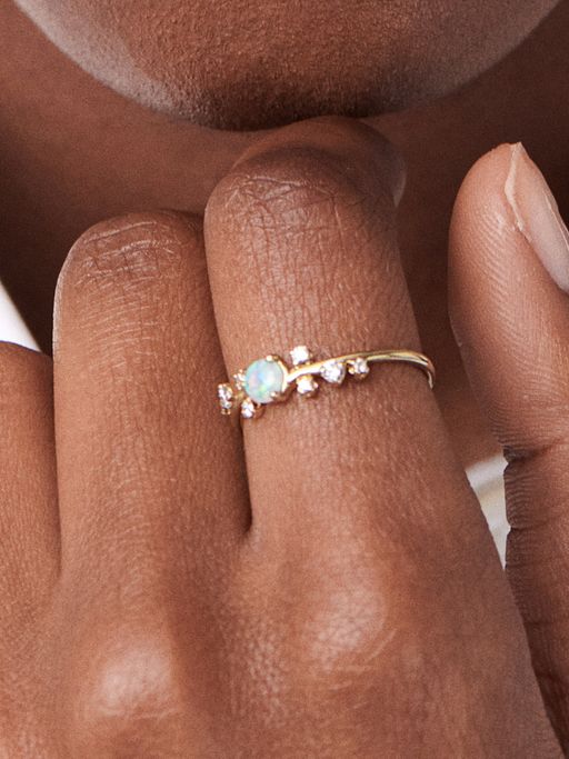 Organic crossover opal and diamond ring photo