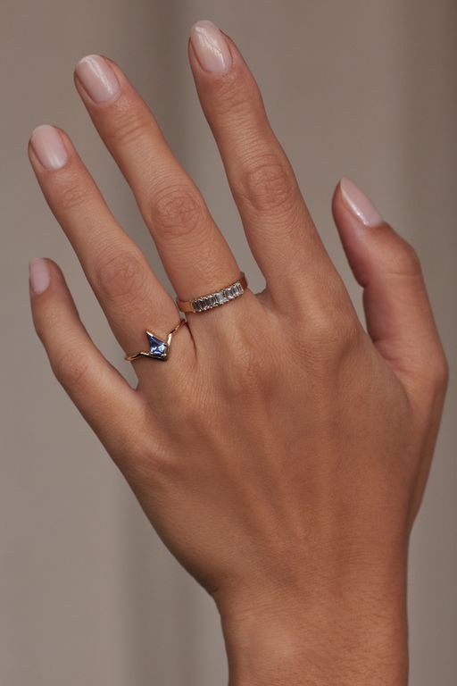 Kite Cut Blue Sapphire Nestled Ring photo