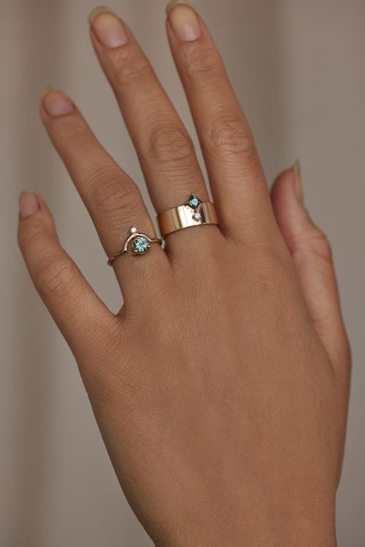 Medium round australian sapphire and diamond nestled ring photo