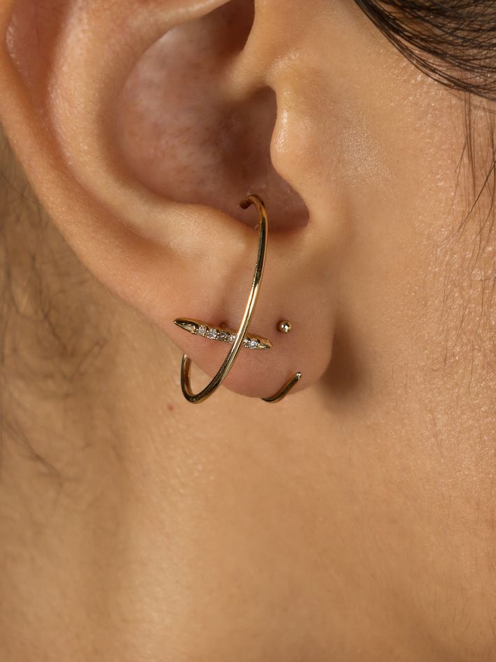 Needle orbit earring