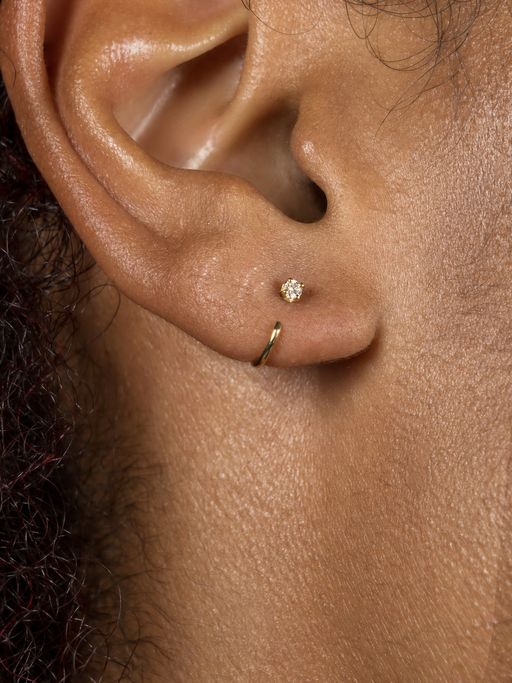 Small diamond claw earring photo