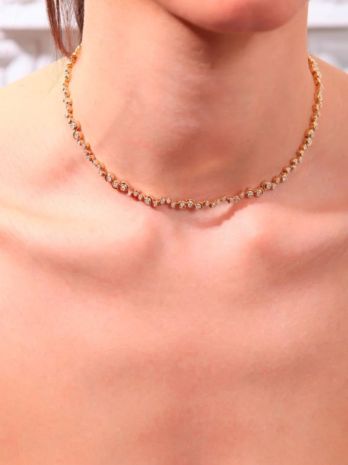 Yellow gold diamond snail river tennis necklace