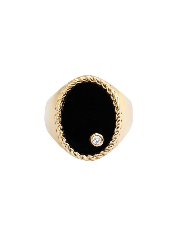 Diamond, onyx and gold oval signet ring