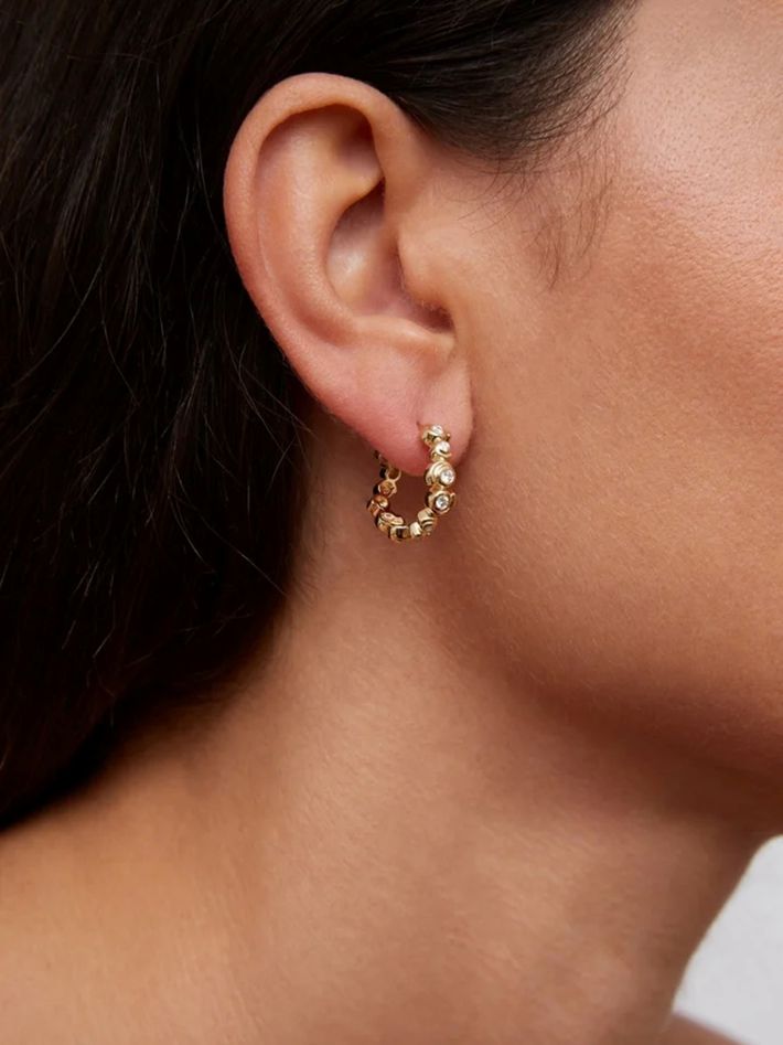 Pair of yellow gold diamond snail hoop earrings