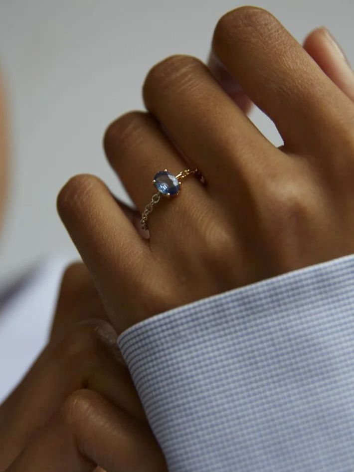 Blue sapphire solitaire ring with mixed golds