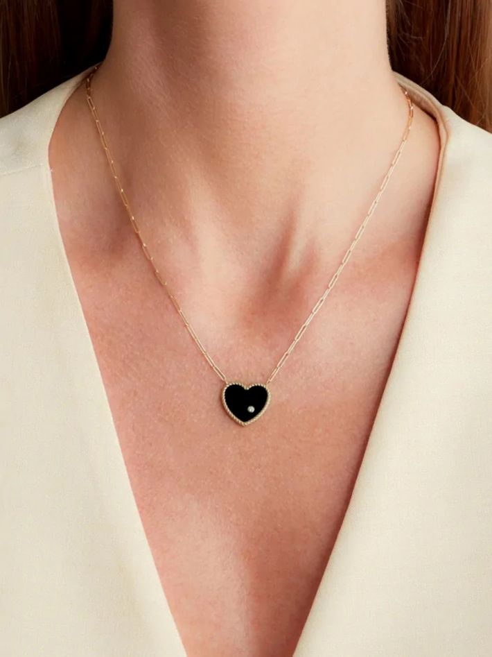 Yellow gold onyx heart diamond necklace