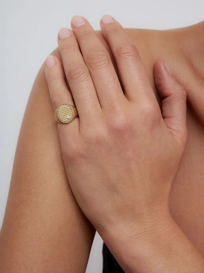 Yellow gold cannage oval signet ring