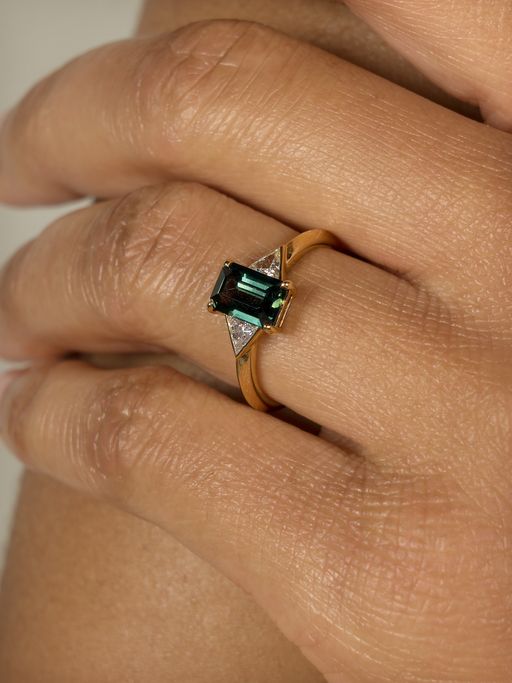 Teal sapphire engagement ring photo