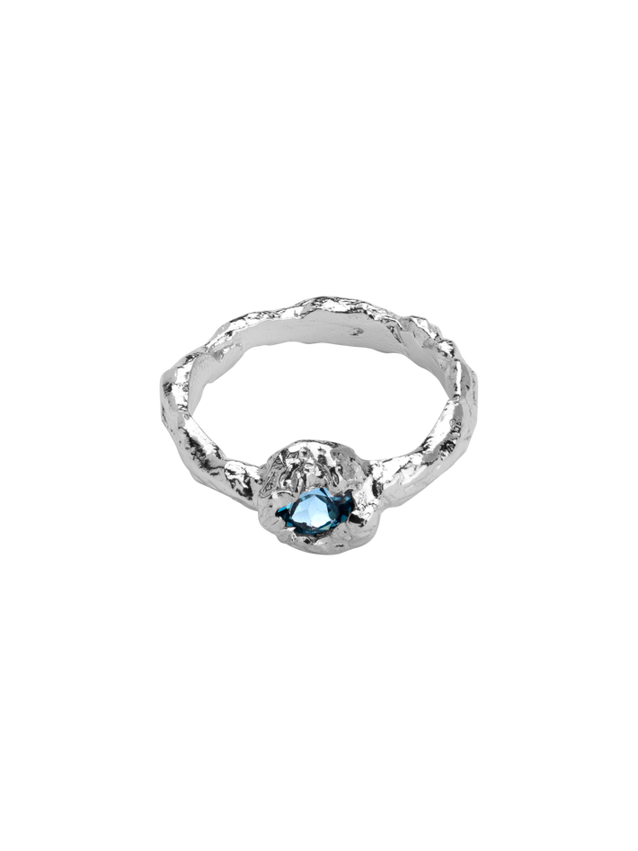 Molten mess round blue topaz ring