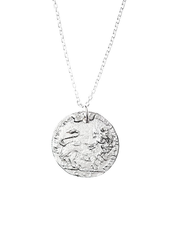 The medium snow lion medallion