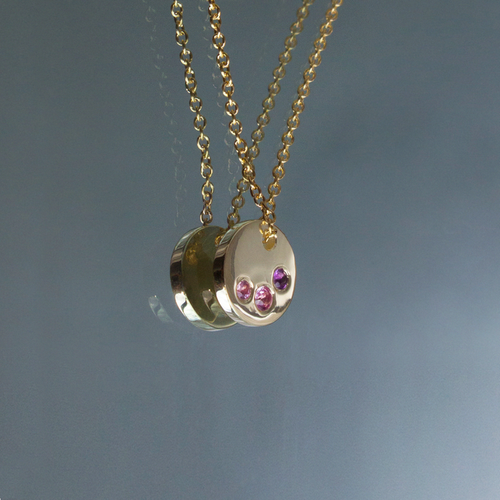 Golden eva round charm necklace