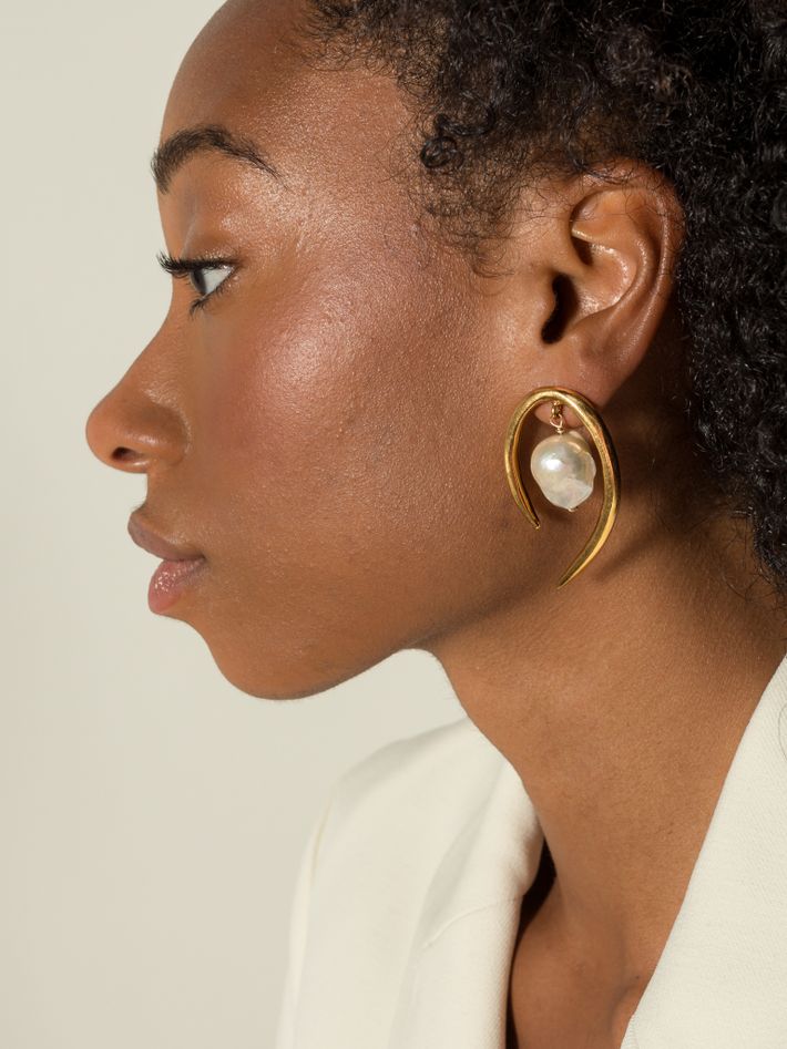 Muse's pearl earrings