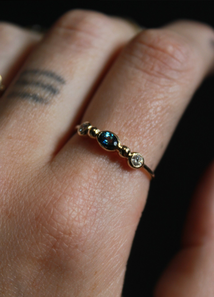 Rowan ring with diamonds and sapphire