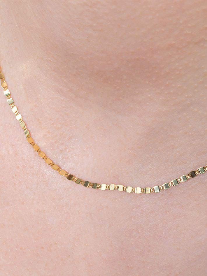 Flat oval disc chain