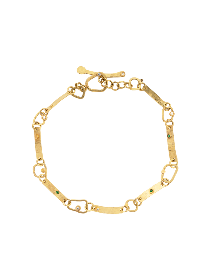 Tui gold bracelet with diamonds and emeralds