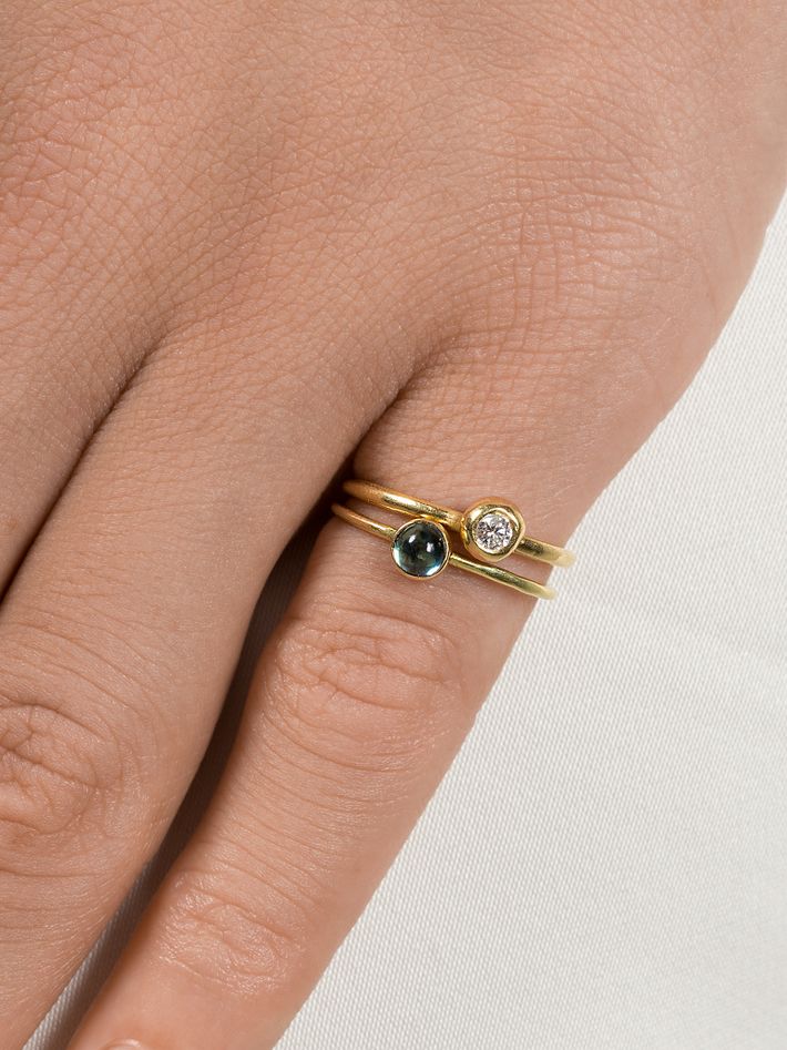 Blue topaz and gold mini ring