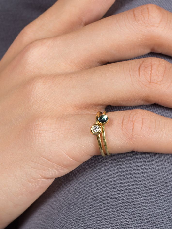 Blue topaz and gold mini ring