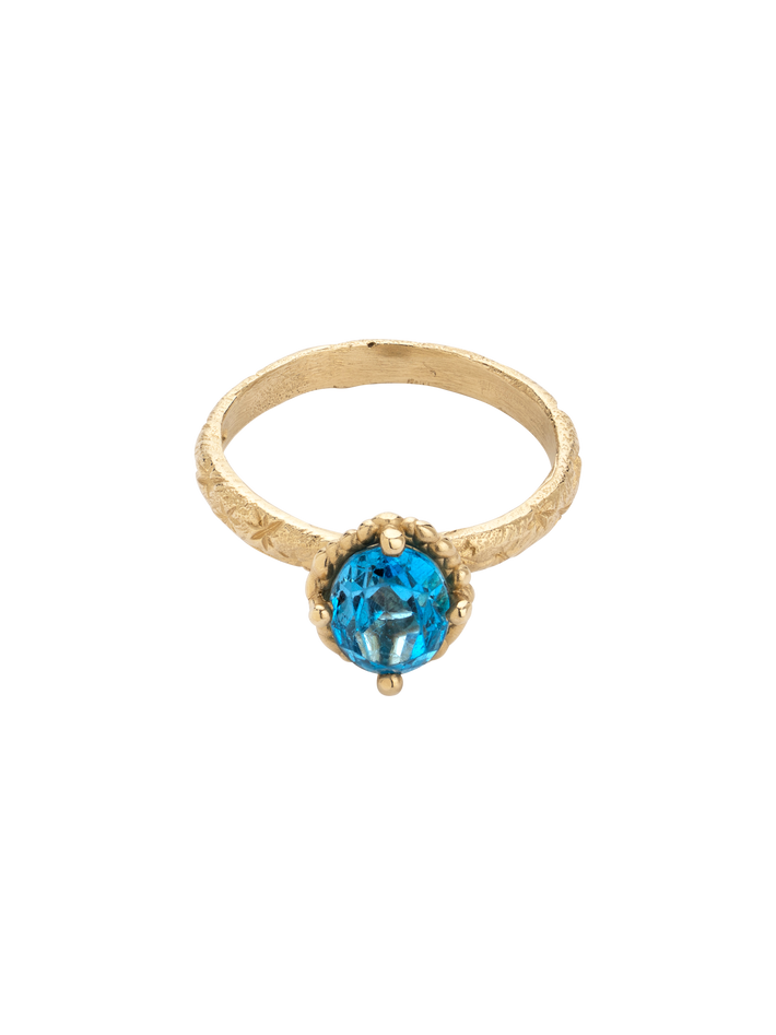 Blue topaz solitaire ring