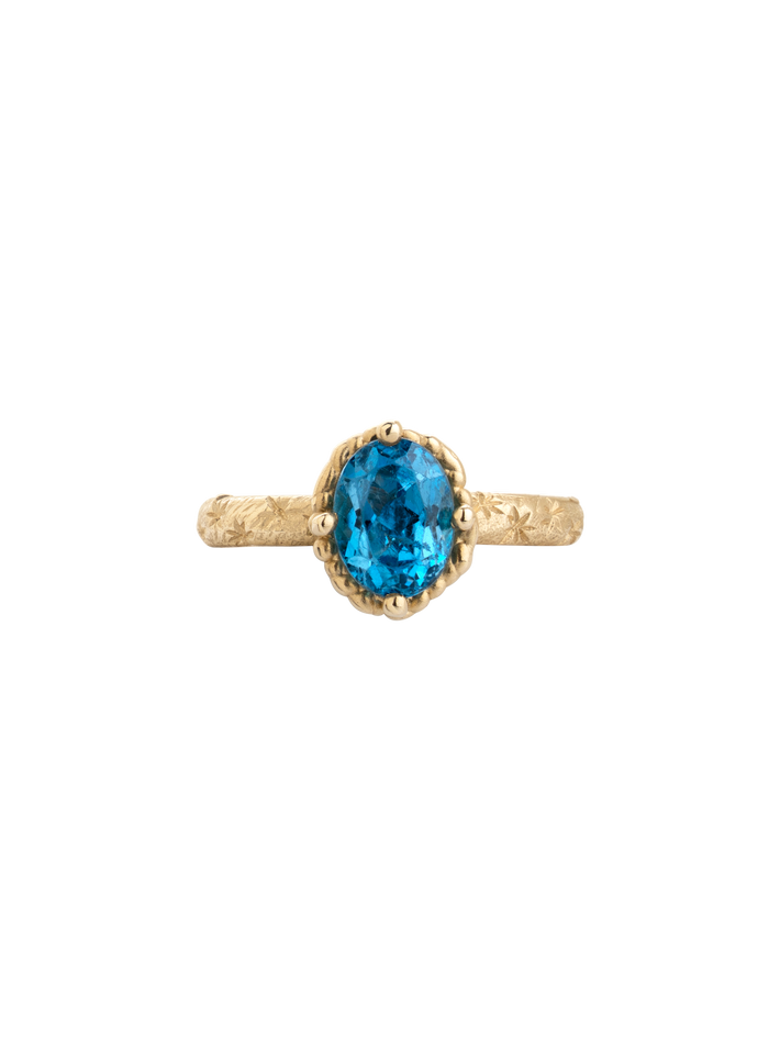 Blue topaz solitaire ring