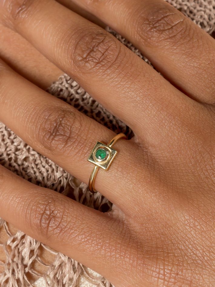 Squared circle emerald ring