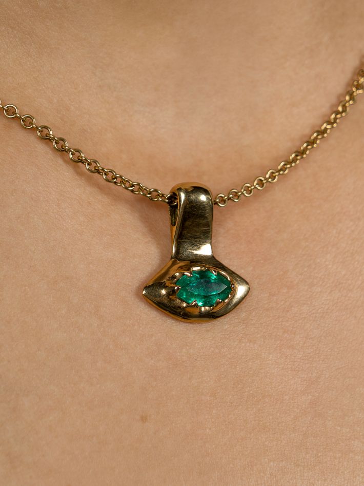 18k evil eye necklace with marquee cut emerald