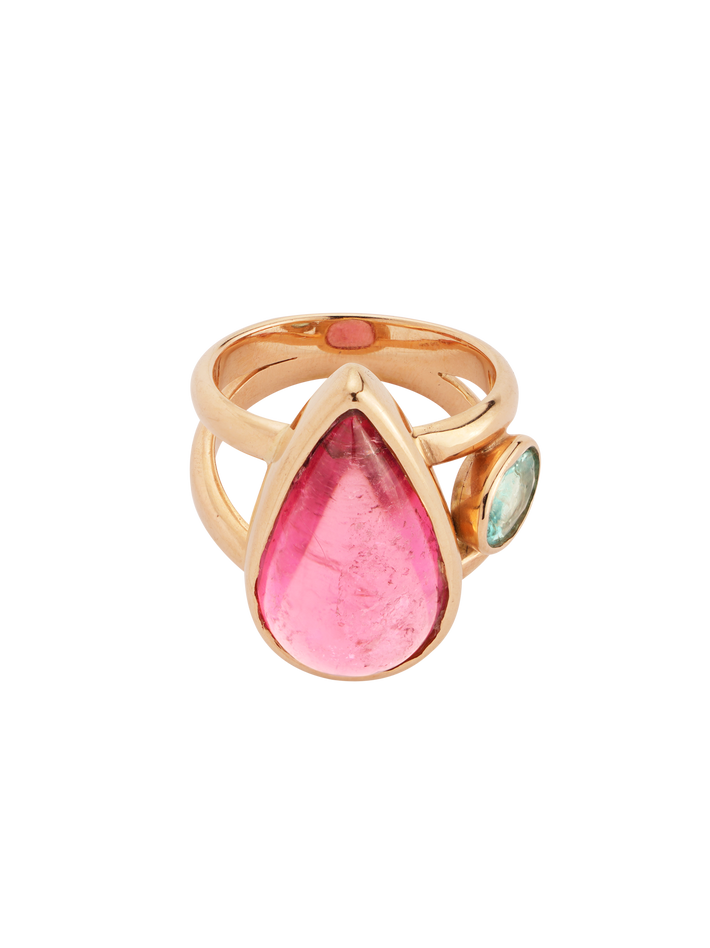 Pear shaped pink tourmaline cabochon and apatite side stone ring