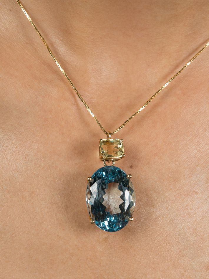 Blue topaz and golden beryl pendant on chain