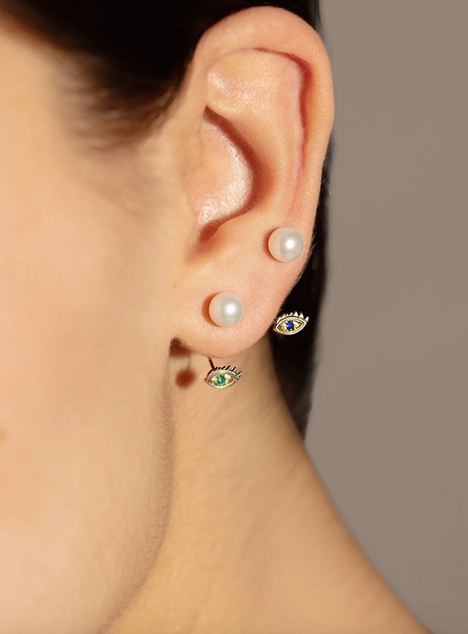 Micro eye piercing earring with emerald photo