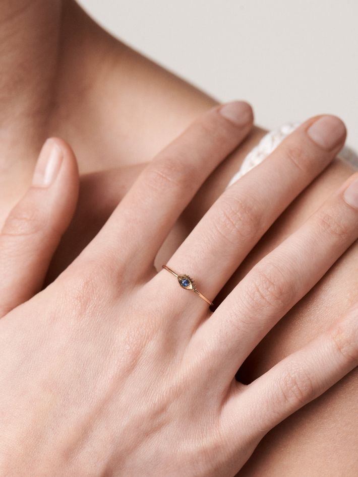 Micro eye sapphire ring