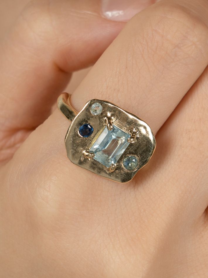 Gold olivia ring with topaz and australian sapphires