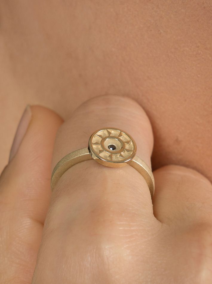 Ennead ring with white diamond