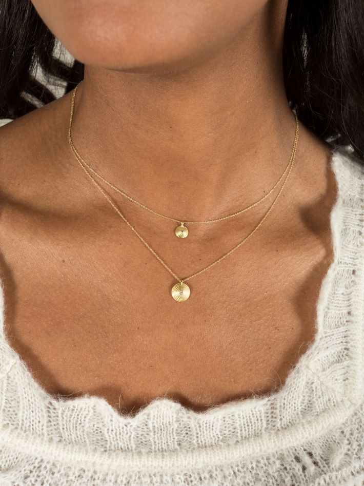 Gold chain necklace and small diamond pendant 
