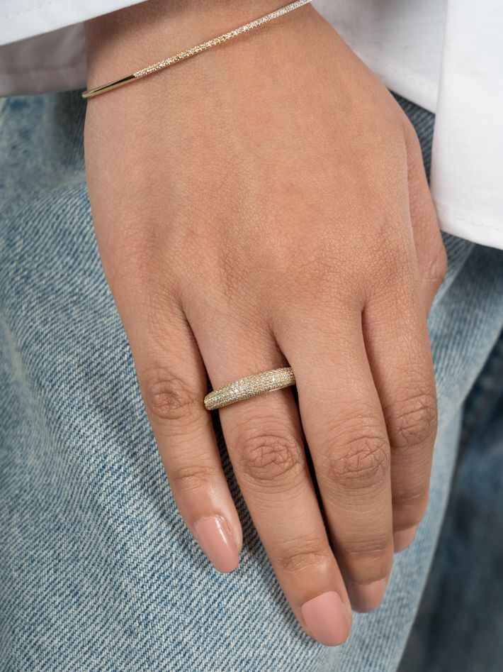 Rising tusk ring with half white pavé diamonds