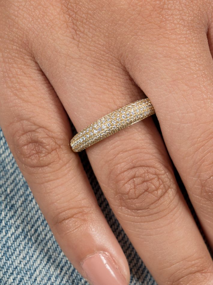 Rising tusk ring with half white pavé diamonds