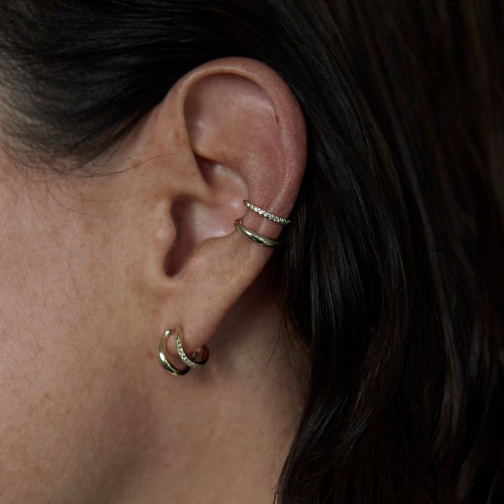 Twin tusk earrings with white pavé diamonds