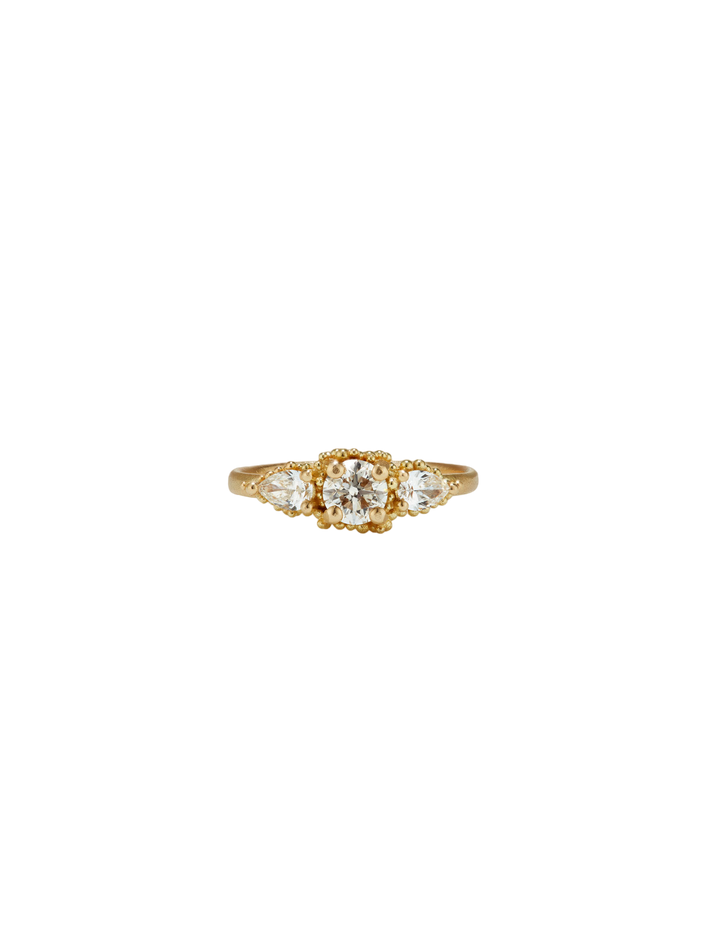 Round raindrop cluster diamond ring