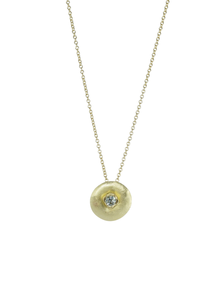 Centre of the sun hammered gold and sapphire pendant