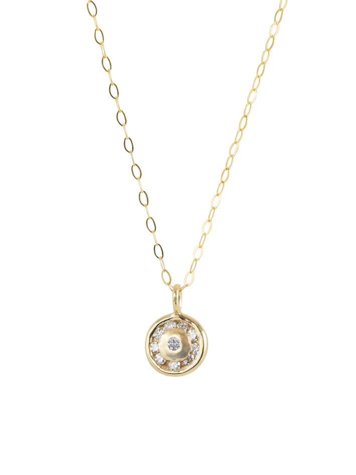 Halogen halo diamond and gold pendant