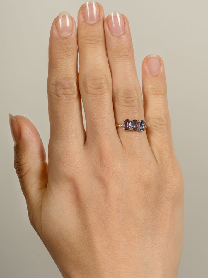 Blue sapphire olive equilibrium ring