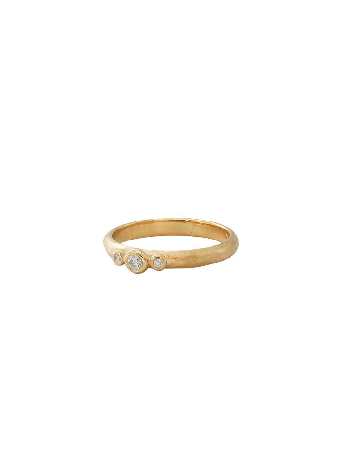 Textured gold ring with 3 diamonds