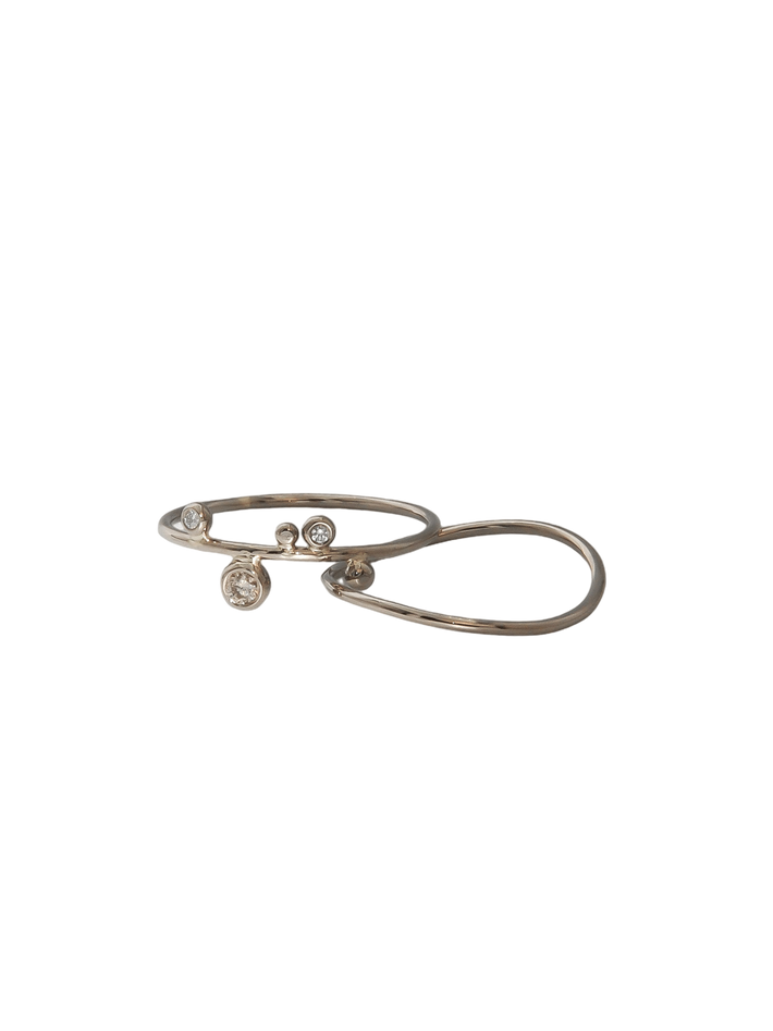 Thin white gold wave ring by Julie Wagner Jewellery Finematter