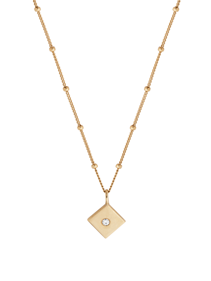 Gold diamond flush set kite pendant