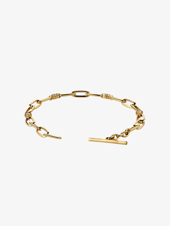 Knife edge oval link diamond station bracelet