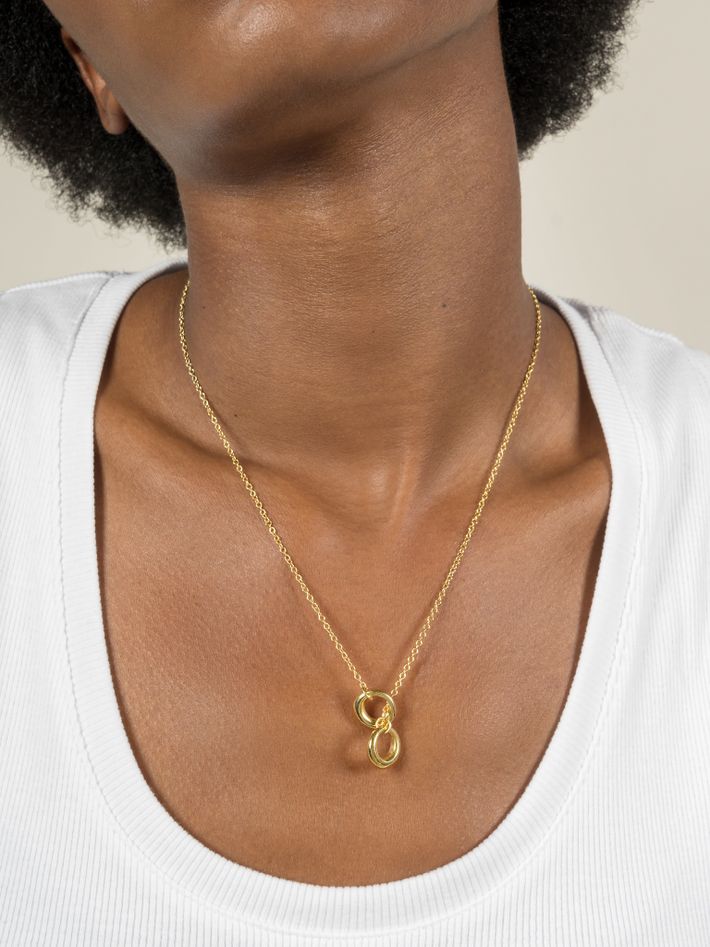 Tapering taurus sliding necklace in gold