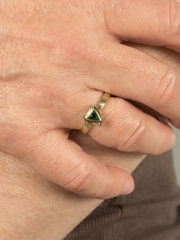 Triangular emerald ring