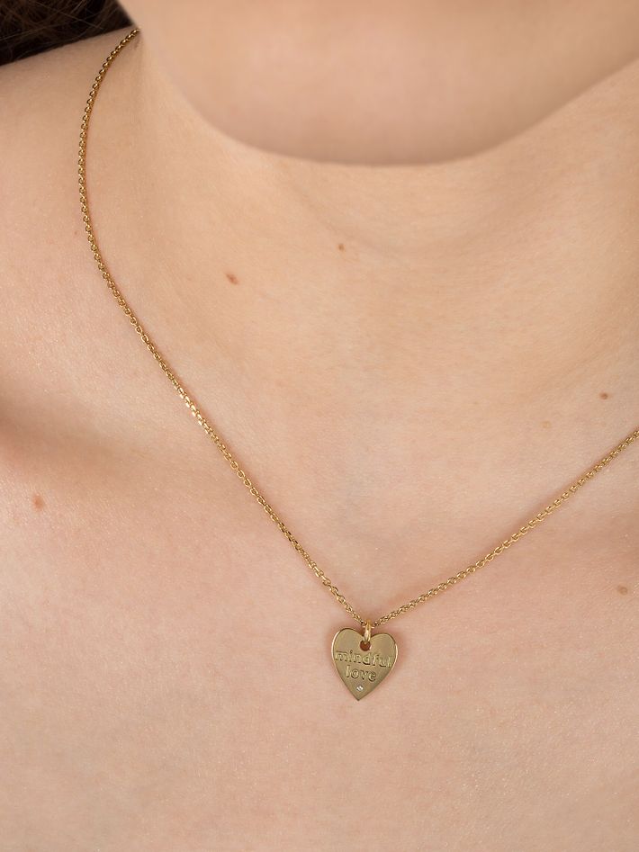 A mindful love heart pendant on chain